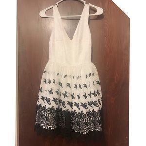 Elegant Bebe deep V dress